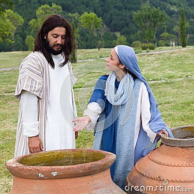 Mother Mary saying to Jesus there is no wine left Stock Photo