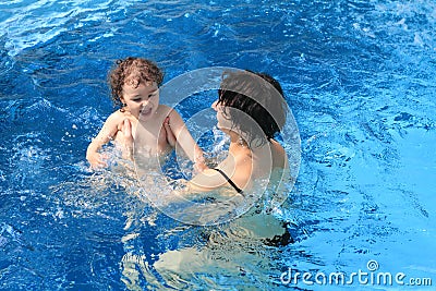 Mother mom with baby swimming Stock Photo