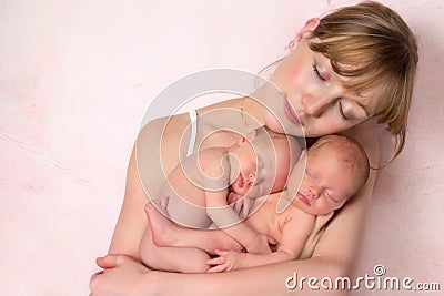 Mother with newborn baby twins Stock Photo