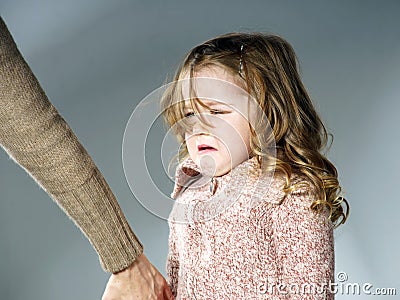 Mother reassuring little daughter Stock Photo