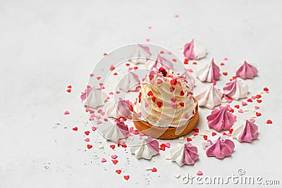 Mother`s day holiday brunch with cupcake craem and pink flowers on white background Stock Photo