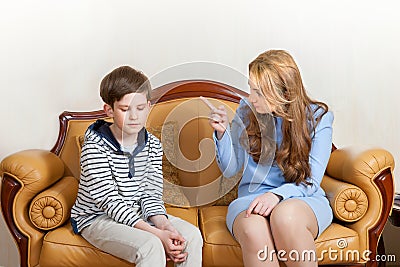 Mother scolds son Stock Photo