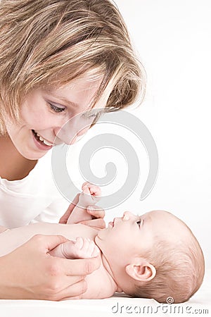 Mother smiling on her baby Stock Photo