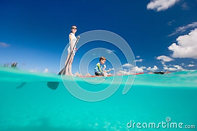 Mother and son paddling Stock Photo