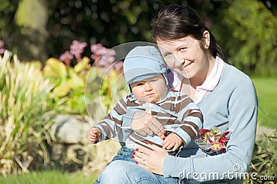 Mother with son in park Stock Photo
