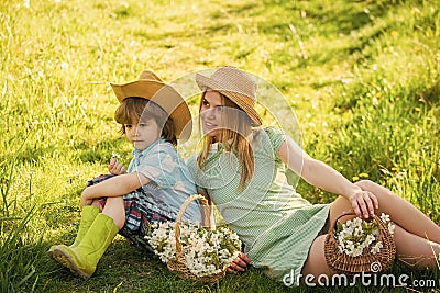 Mother and son relaxing. Spring holiday. Good vibes. Spring season. Love and respect motherland. Weekend leisure Stock Photo