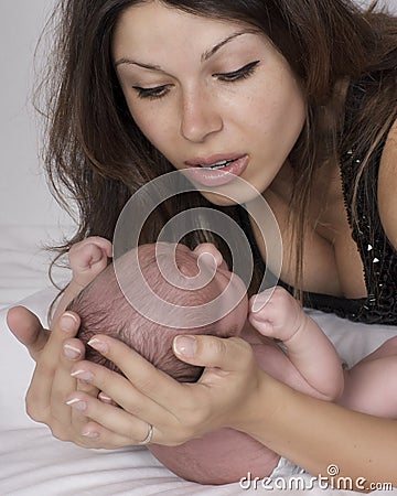 Mother soothing baby Stock Photo