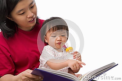 Mother story telling her daughter Stock Photo