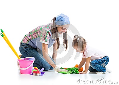 Mother teaches daughter child cleaning room Stock Photo