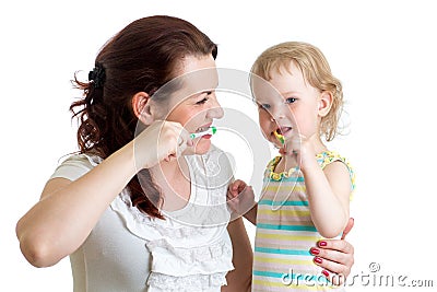 Mother teaches her daughter kid teeth brushing Stock Photo