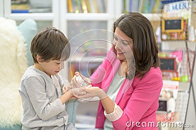 Mother Teaching son Sanitary Prevention Measures Stock Photo