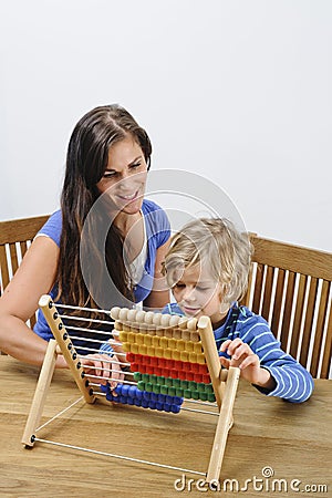 Mother teaching son Stock Photo