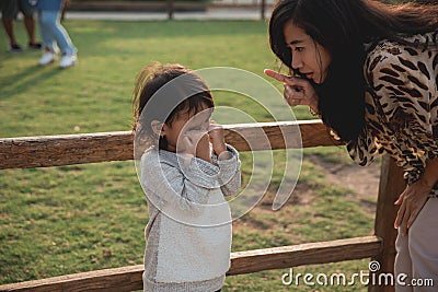 Mother telling her little daughter Stock Photo