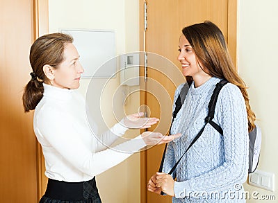Mother tries admonishment to his teen daughter Stock Photo