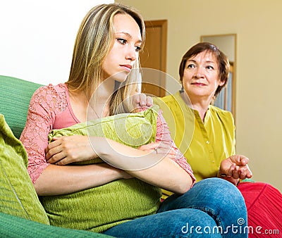 Mother trying to reconcile with daughter Stock Photo