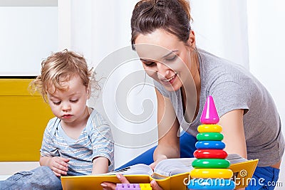 Mother viewing photo album with son Stock Photo