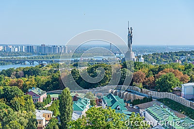 Motherland monument viewed behind Kiev Pechersk lavra in Kiev, Ukraine Stock Photo