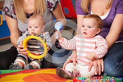 Mothers And Babies At Music Group Stock Photo