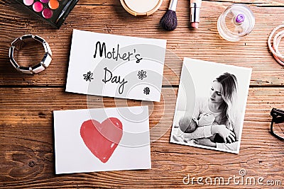 Mothers day composition. Mother and baby picture, note. Stock Photo