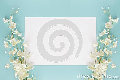 Mothers day or wedding floral card over blue Stock Photo