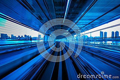 Motion blur of Automatic train moving inside tunnel in Tokyo, Japan Stock Photo