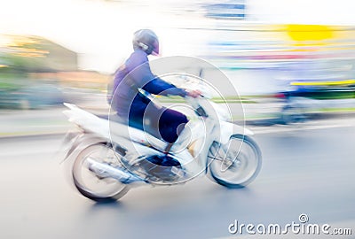 Motion blur background : red motorcycle running on road ,blurred background Stock Photo