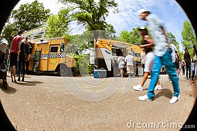 Motion Blur Fisheye Perspective Of People At Food Truck Festival Editorial Stock Photo