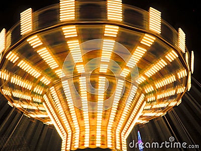 Long exposure picture of a traditional fairground ride Stock Photo