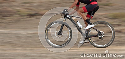 Motion blur of a mountain bike race Stock Photo