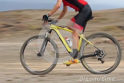 Motion blur of a mountain bike race Stock Photo