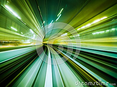Motion blur train moving in city rail tunnel. Stock Photo