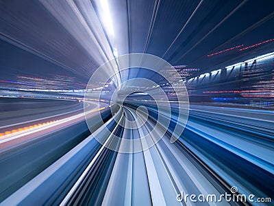 Motion blur of train moving inside tunnel, Japan Stock Photo