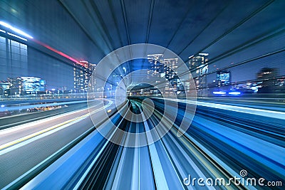 Motion blur of train moving inside tunnel in Tokyo, Japan Stock Photo