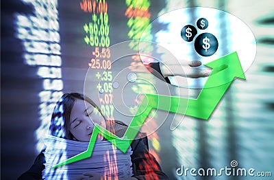 Motion blur of up trend arrow line chart with trader and computer in the marketing room on blurred stock board background in busin Stock Photo