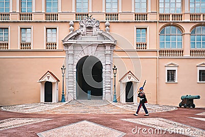 Motion blurred marching sentry guard in front of Prince& x27;s Palace of Monaco Editorial Stock Photo