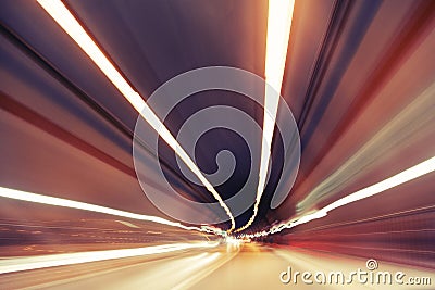 Motion blurred modern traffic tunnel Stock Photo