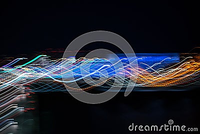 Motion night lights abstract, city traffic trails effect shoot from window car, fast driving movement Stock Photo