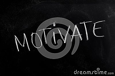 Motivate Text on Blackboard Stock Photo