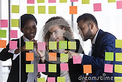 Motivated diverse business team planning project tasks Stock Photo