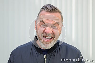 Motivated excited middle-aged man giving a thumbs up Stock Photo