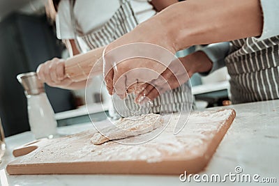 Motivated mother and daughter cooking tasty lunch Stock Photo