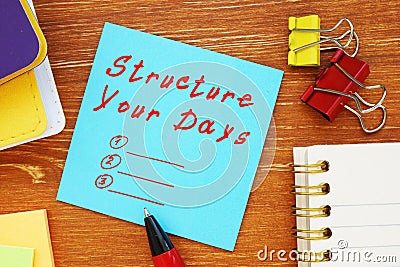 Motivation concept about Structure Your Days with phrase on the page Stock Photo
