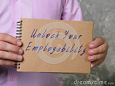 Motivational concept meaning Unlock Your Employability with inscription on the piece of paper Stock Photo