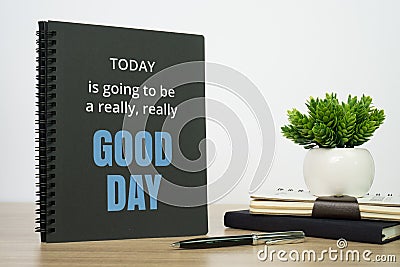 Notebook with motivational quote. Stock Photo