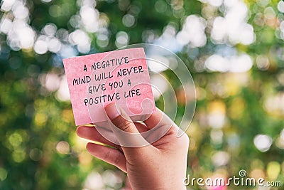 Life Motivational and inspirational quotes - A negative mind will never give you a positive life Stock Photo