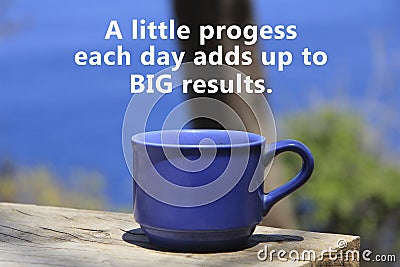 Motivational quote - A little progress each day adds up to big results. With a cup of coffee on table on blue beach background. Stock Photo