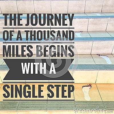 Motivational quotes of the journey of a thousand miles begin with a single step Stock Photo