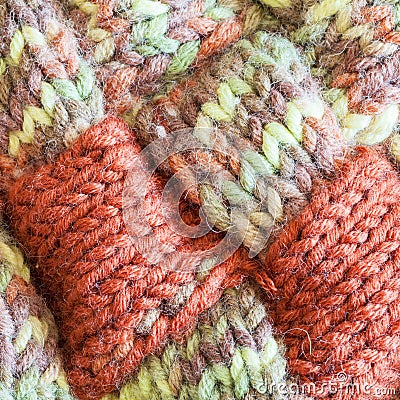 Motley hand knitted wool fabric close up Stock Photo