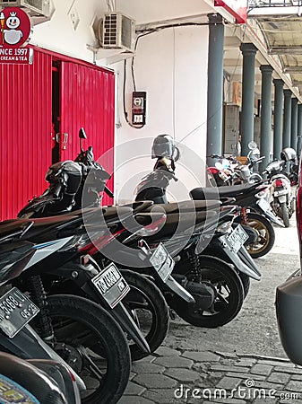 Moto cycling street parking Editorial Stock Photo