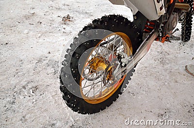 Motocross motorcycle wheel with thorns Stock Photo